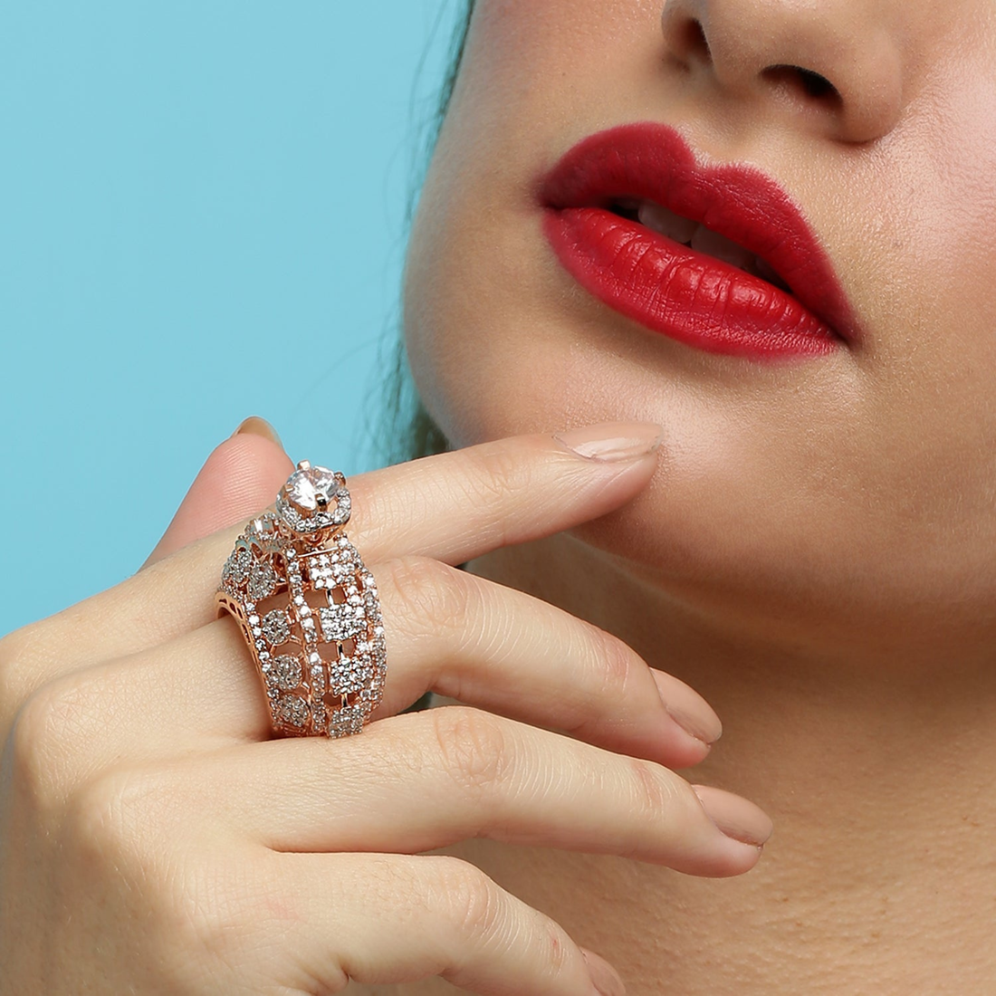Elegant model wearing 925 Sterling Silver Blingy Sophistication Crown Statement Ring in bold luxury pose