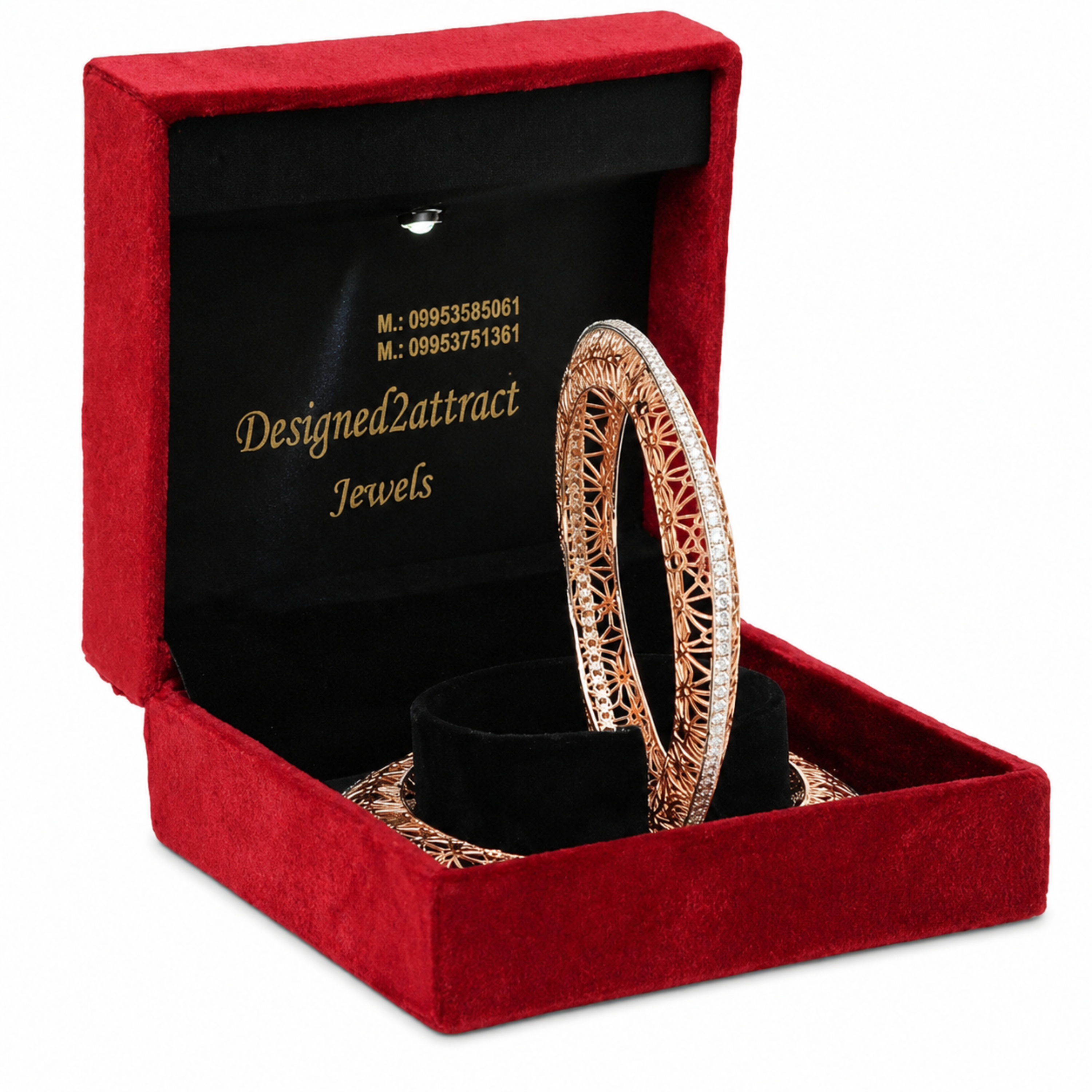 Rose gold bangles in a red jewelry box with 'Designed2attract Jewels' branding.