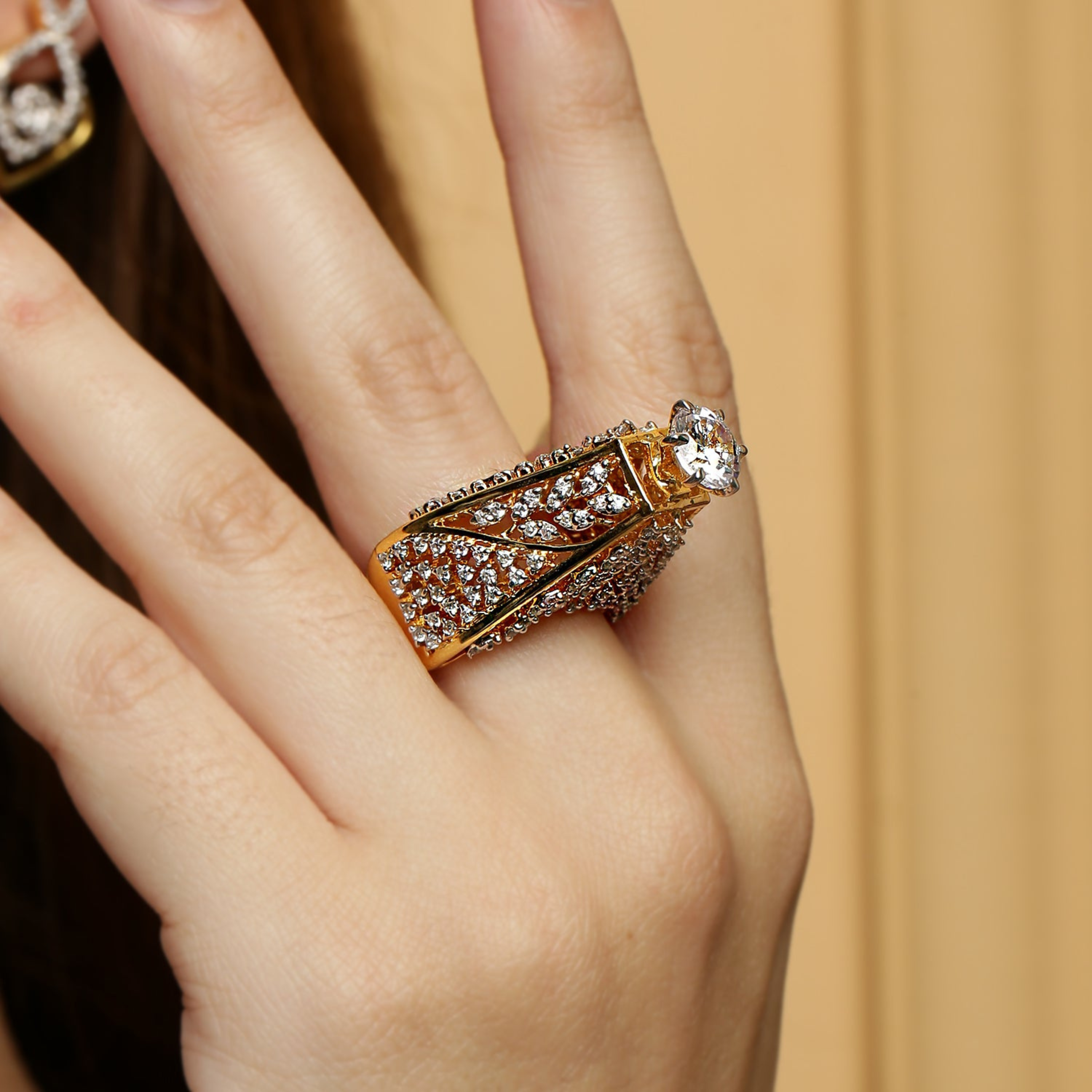 Elegant hand shot of model wearing 925 sterling silver diamond ring