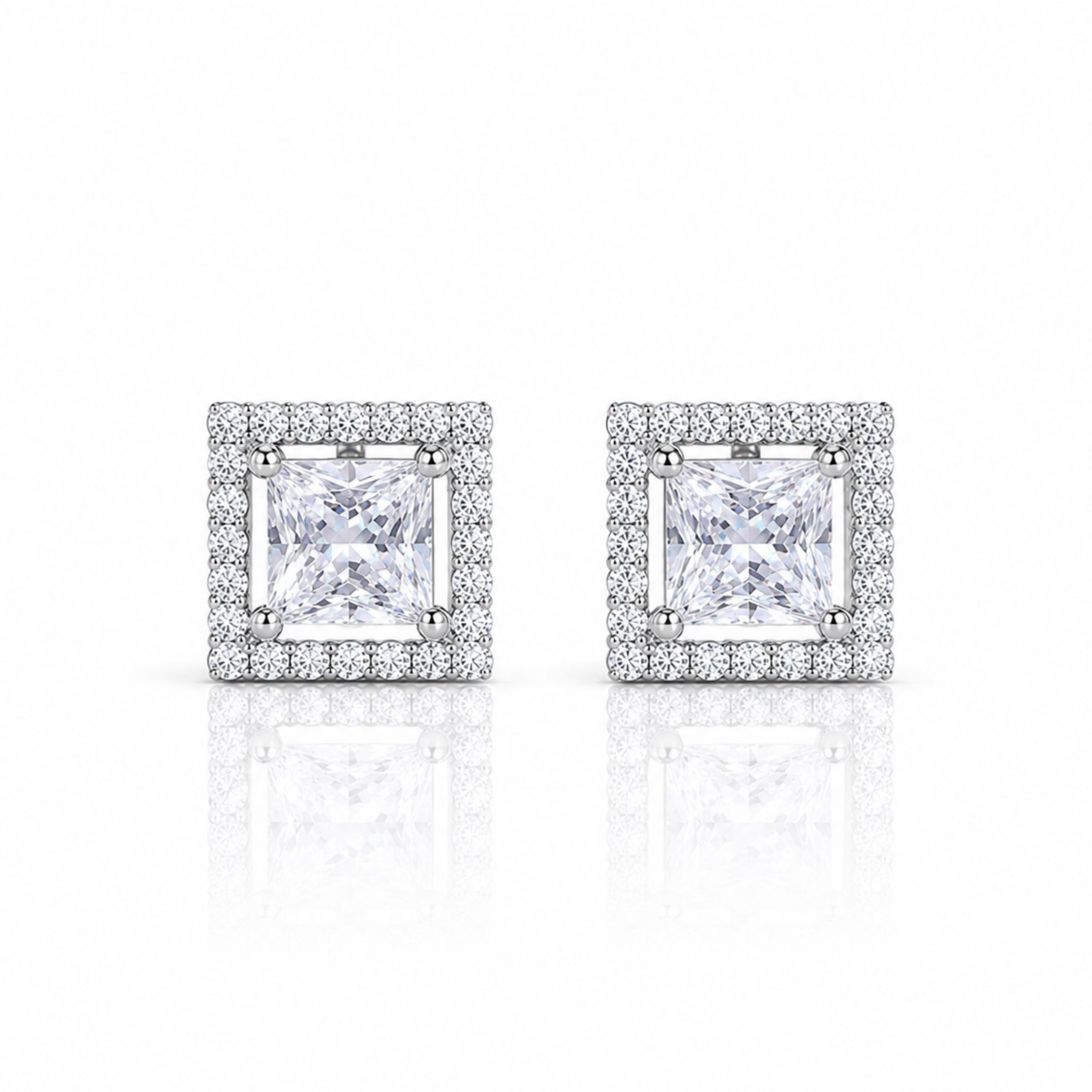 Square halo stud earrings in 925 sterling silver with princess cut center stone on white background