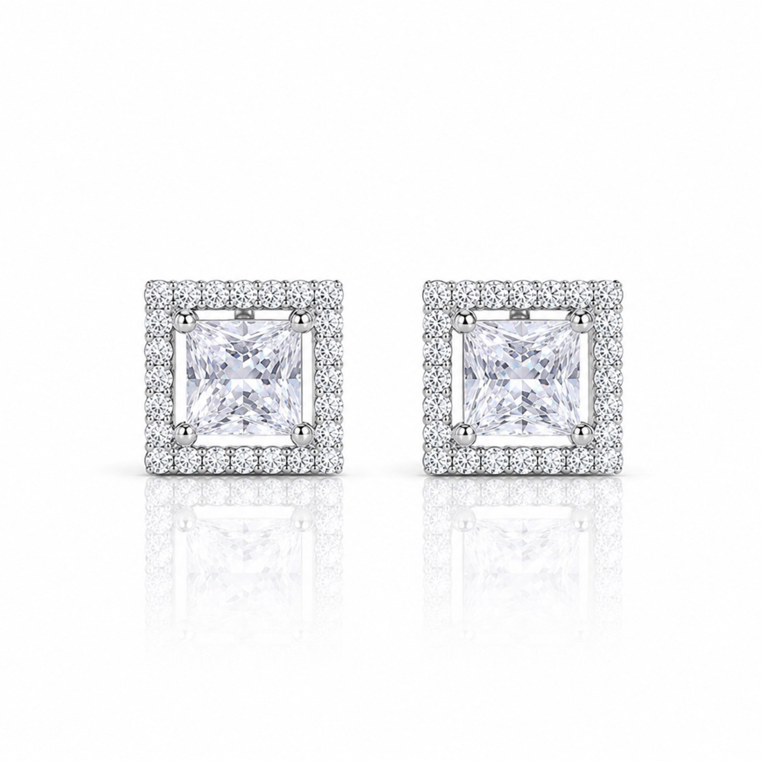 Square halo stud earrings in 925 sterling silver with princess cut center stone on white background