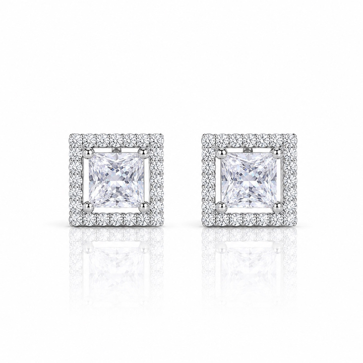 Square halo stud earrings in 925 sterling silver with princess cut center stone on white background