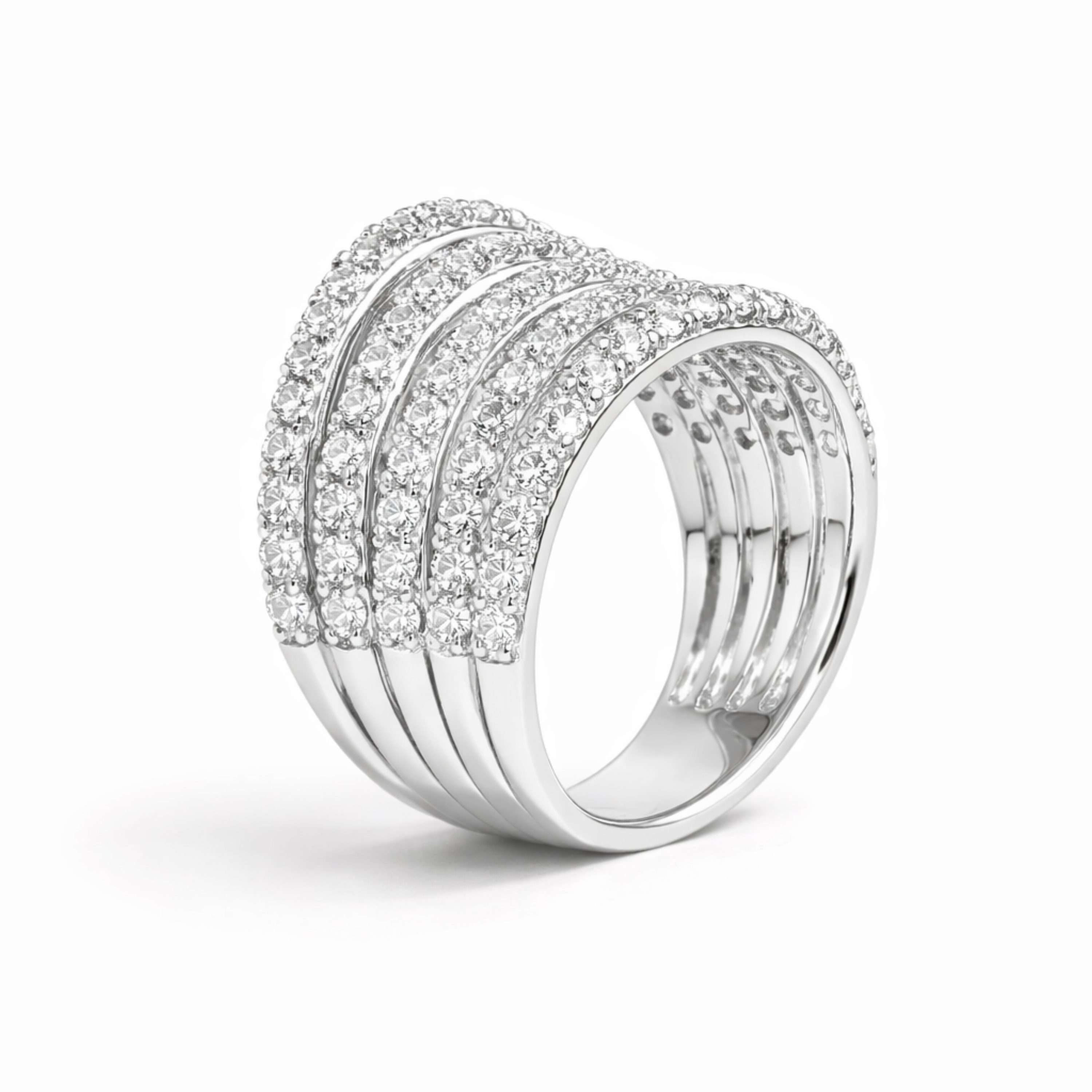 Silver ring with multiple bands and embedded stones on a white background