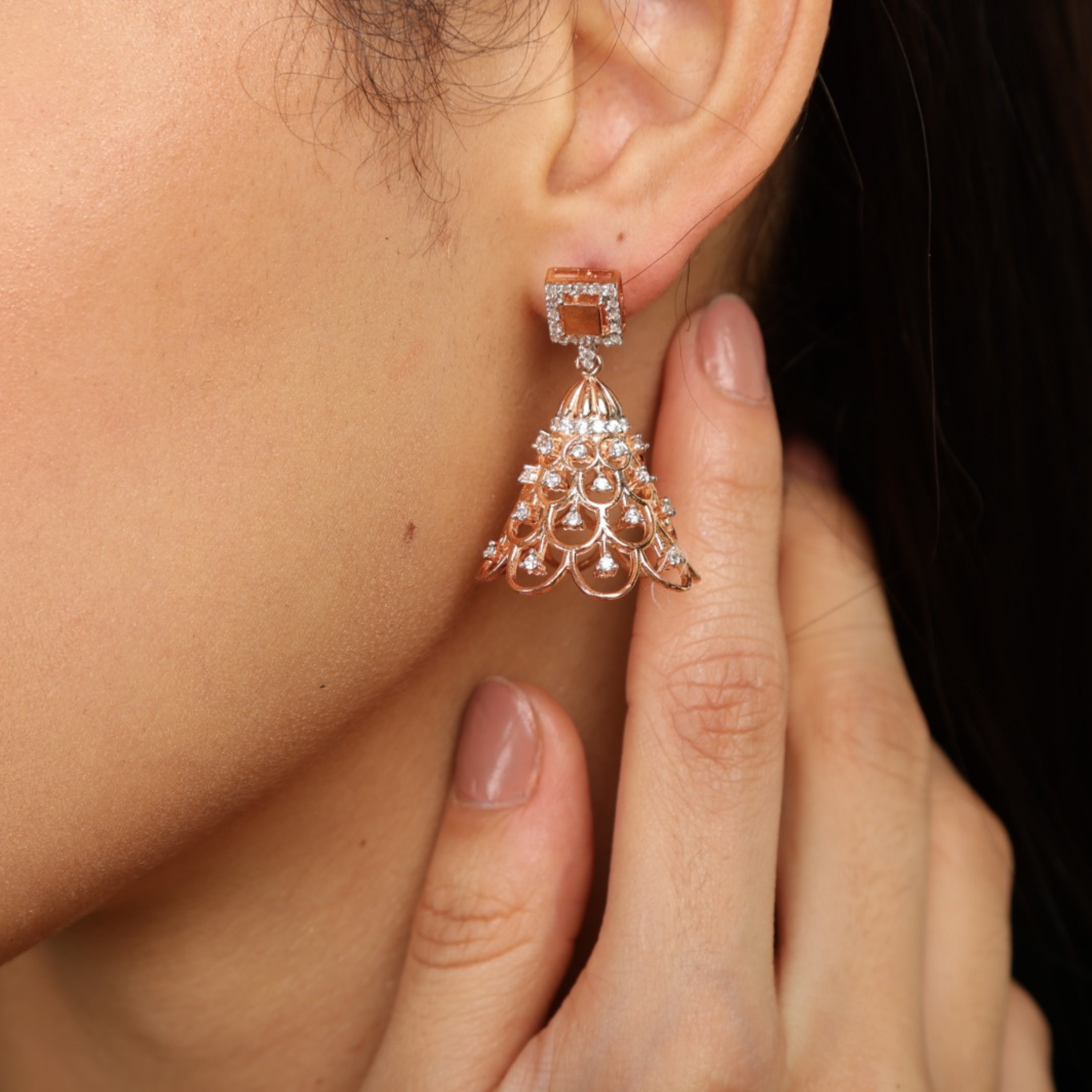    Model wear Noor Square drop earrings in 925 sterling silver with CZ diamonds rose gold finish