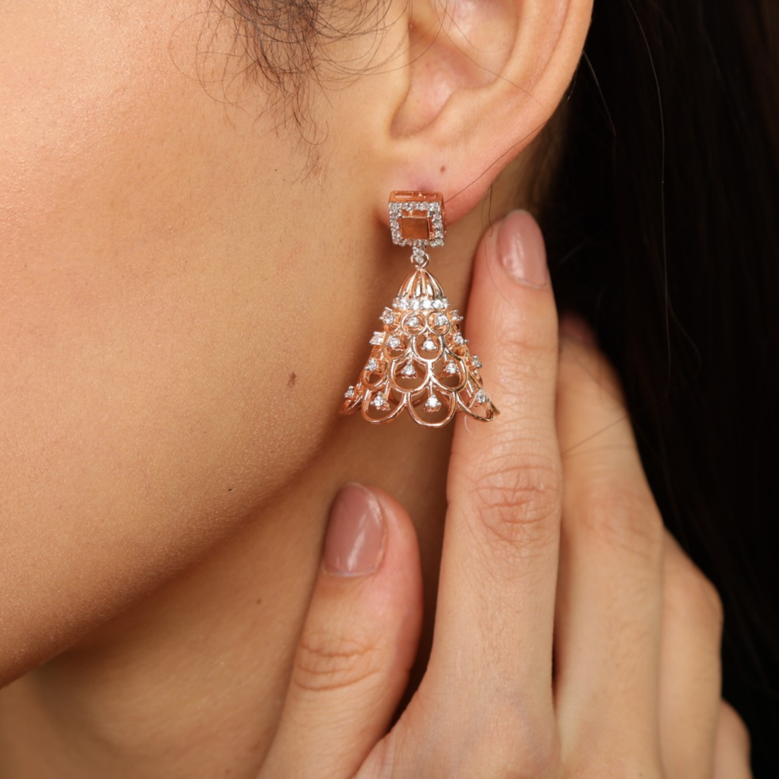    Model wear Noor Square drop earrings in 925 sterling silver with CZ diamonds rose gold finish