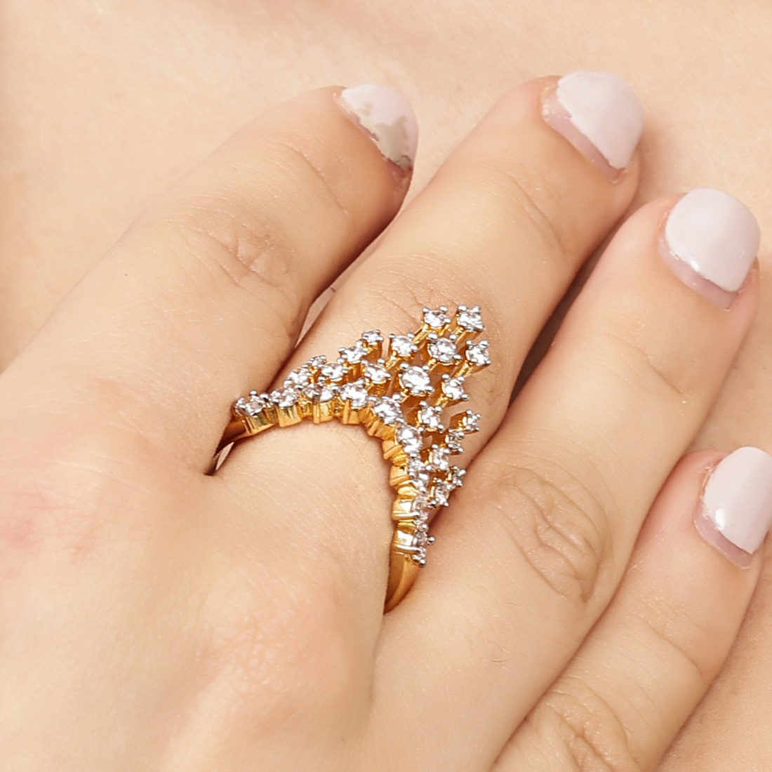 A Crown of Brilliance 925 sterling silver crown ring with gold polish and sparkling white stones worn on hand – Designed2Attract
