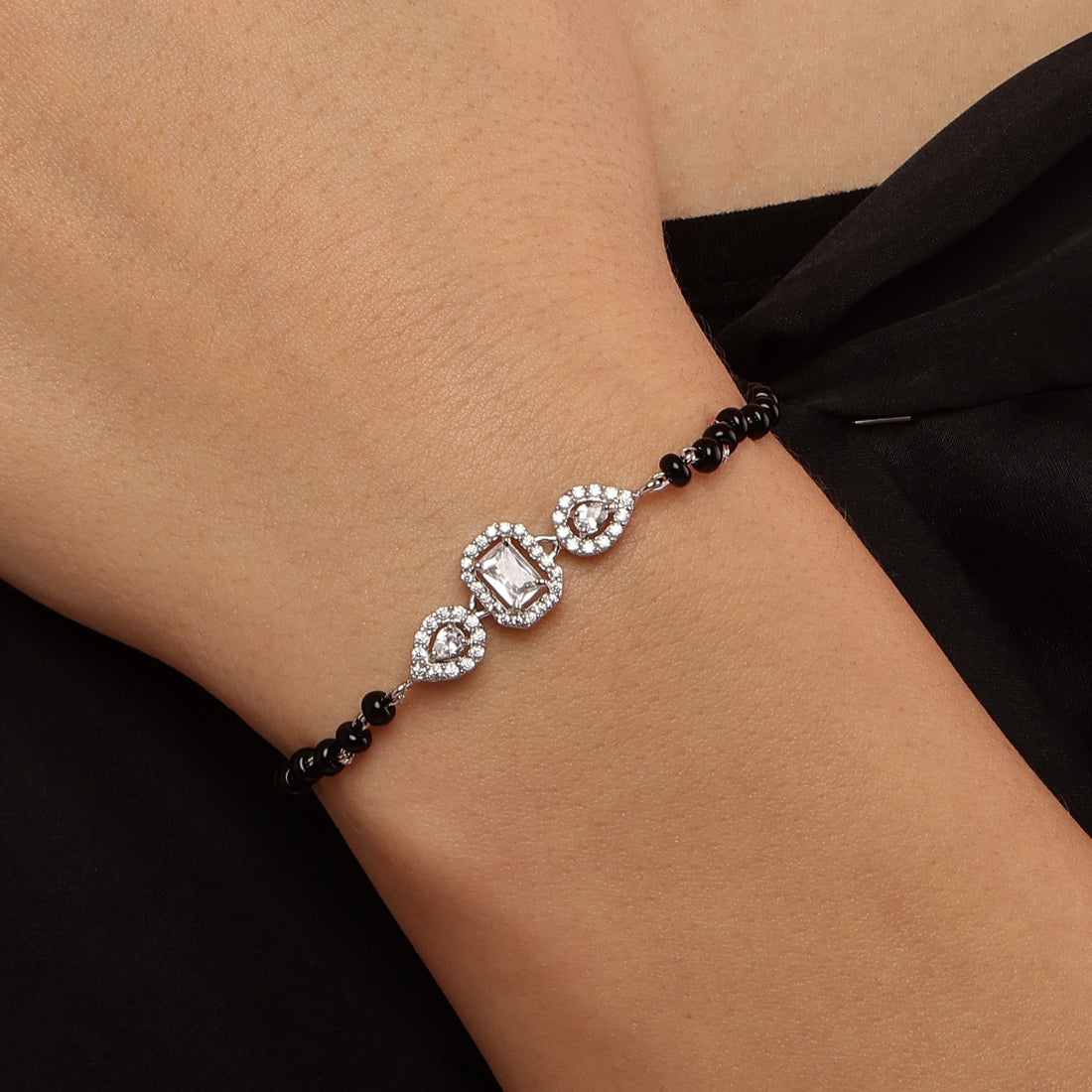 Aurora Loop Mangalsutra sterling silver bracelet worn on wrist