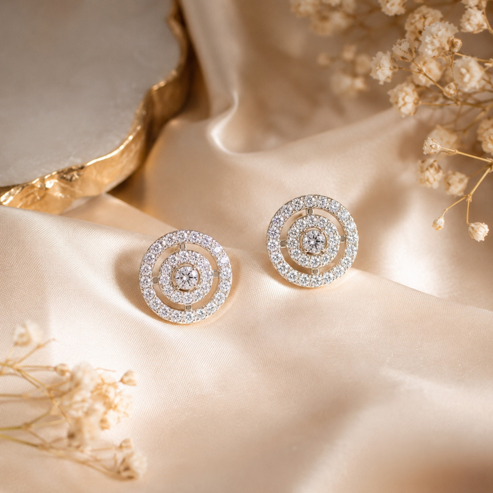 Premium creative jewellery photography of circular diamond stud earrings on elegant satin background, luxury realistic website banner image