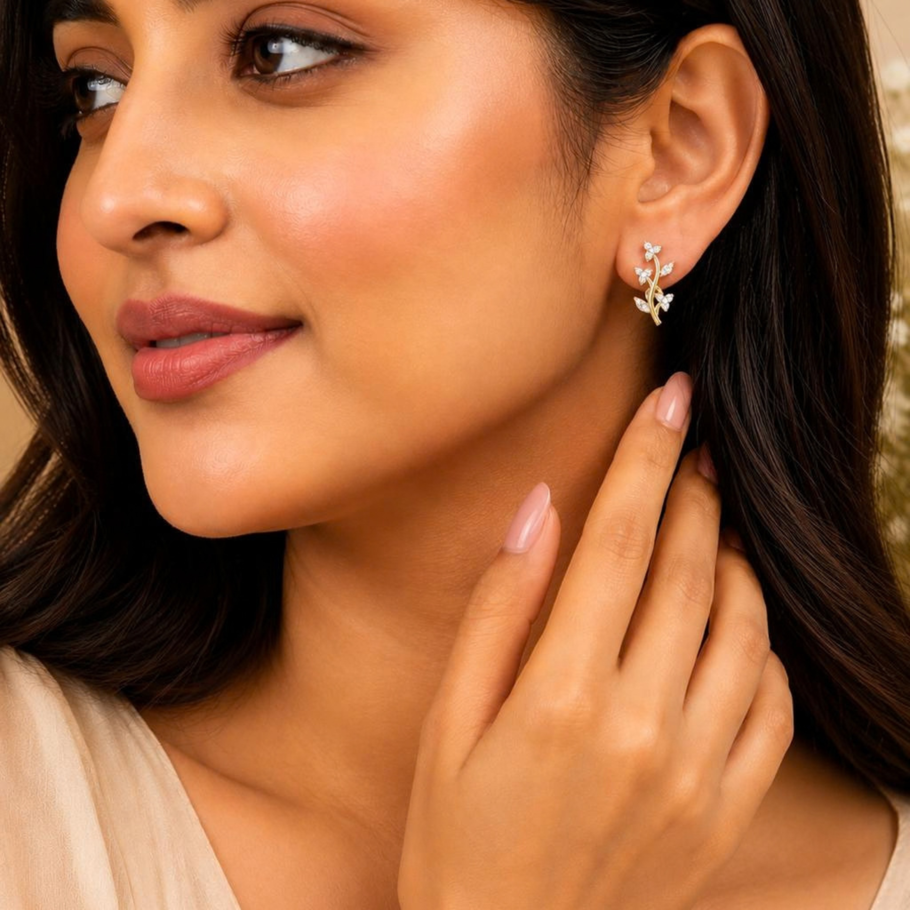 Woman wearing Designed2Attract floral vine 925 sterling silver earrings in golden polish