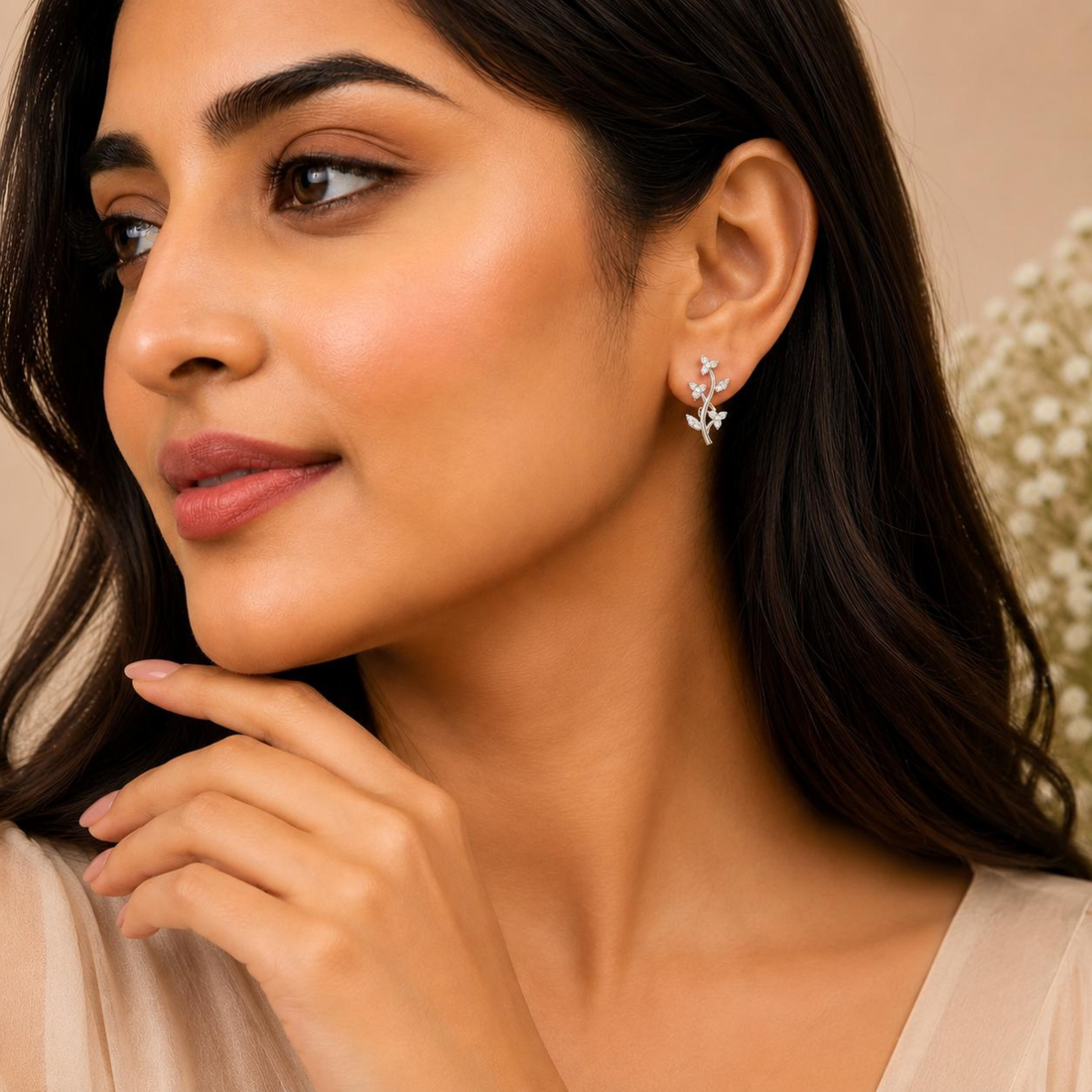Woman wearing Designed2Attract floral vine 925 sterling silver earrings in white polish