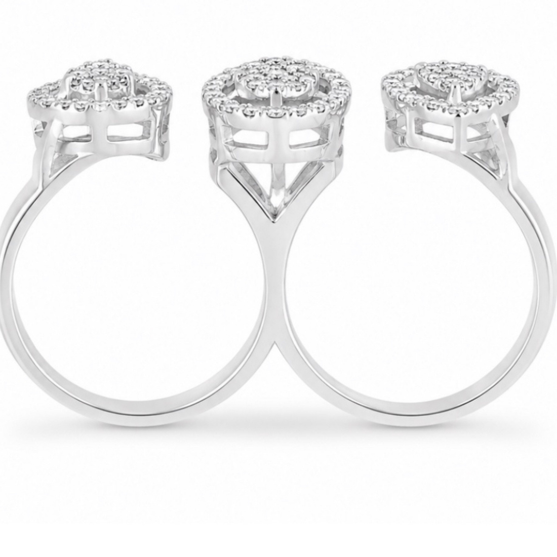Silver ring with diamond accents on a white background