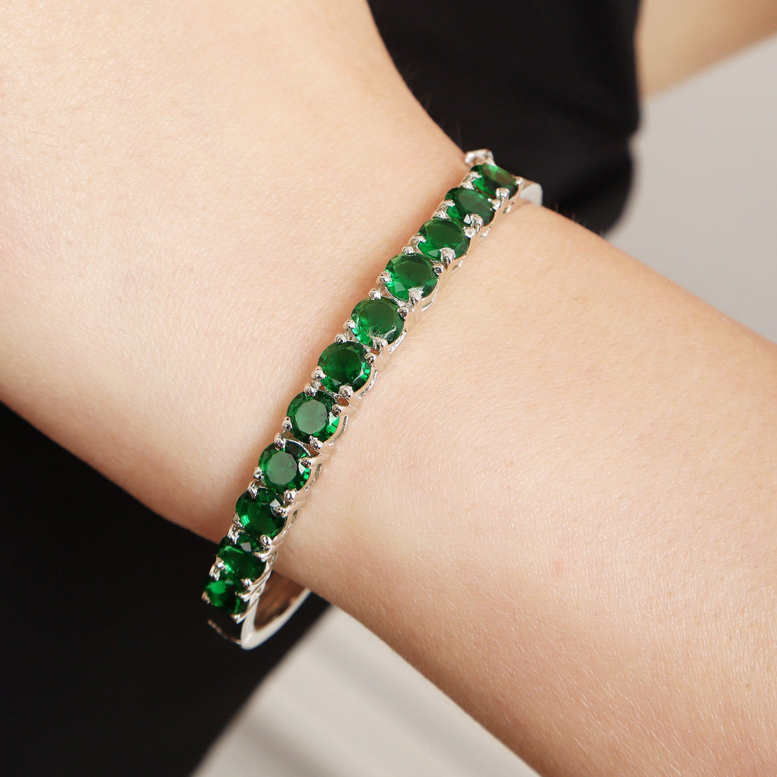 Emerald Linear Charm sterling silver bracelet worn on wrist