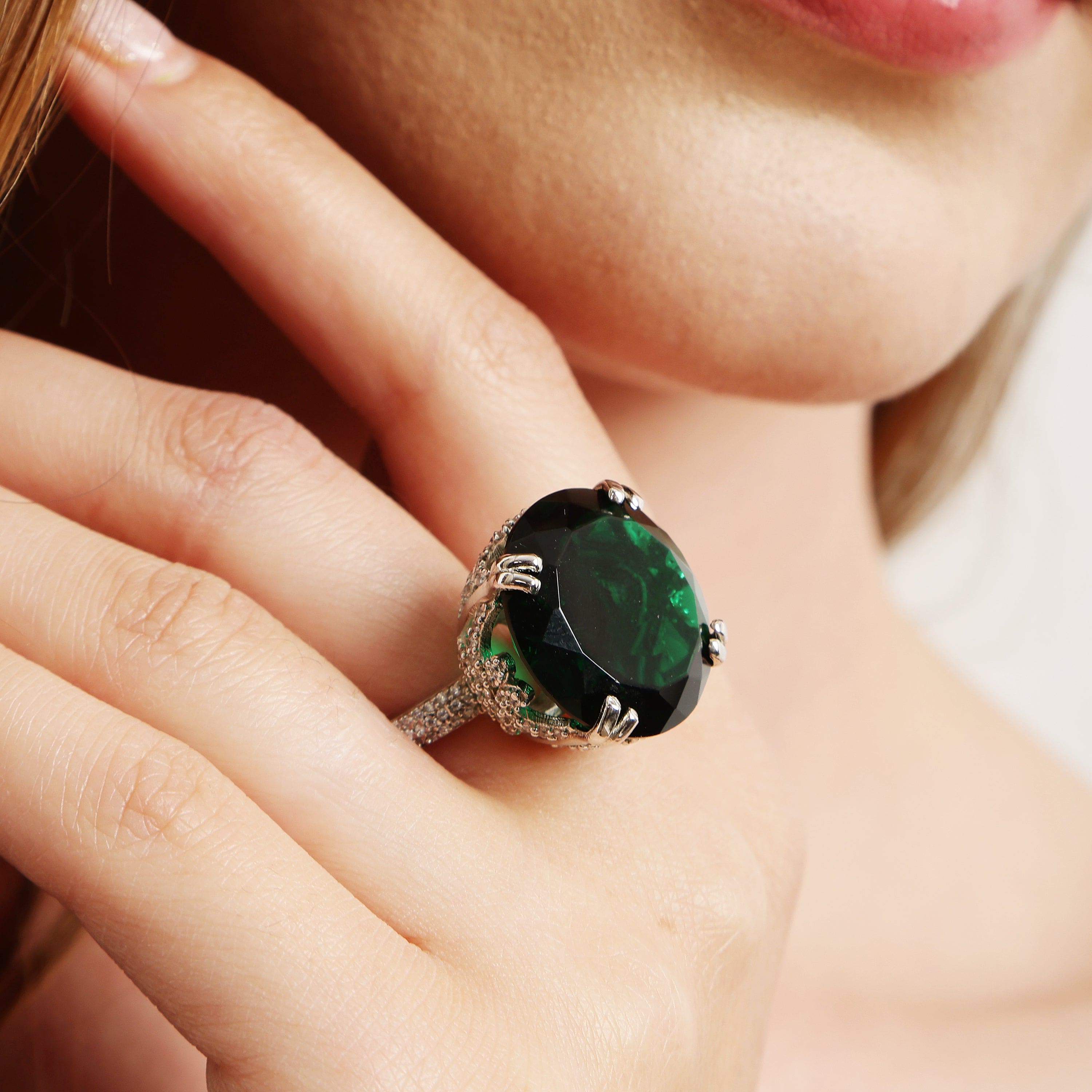 Emerald Serenade sterling silver ring close-up view of emerald stone setting
