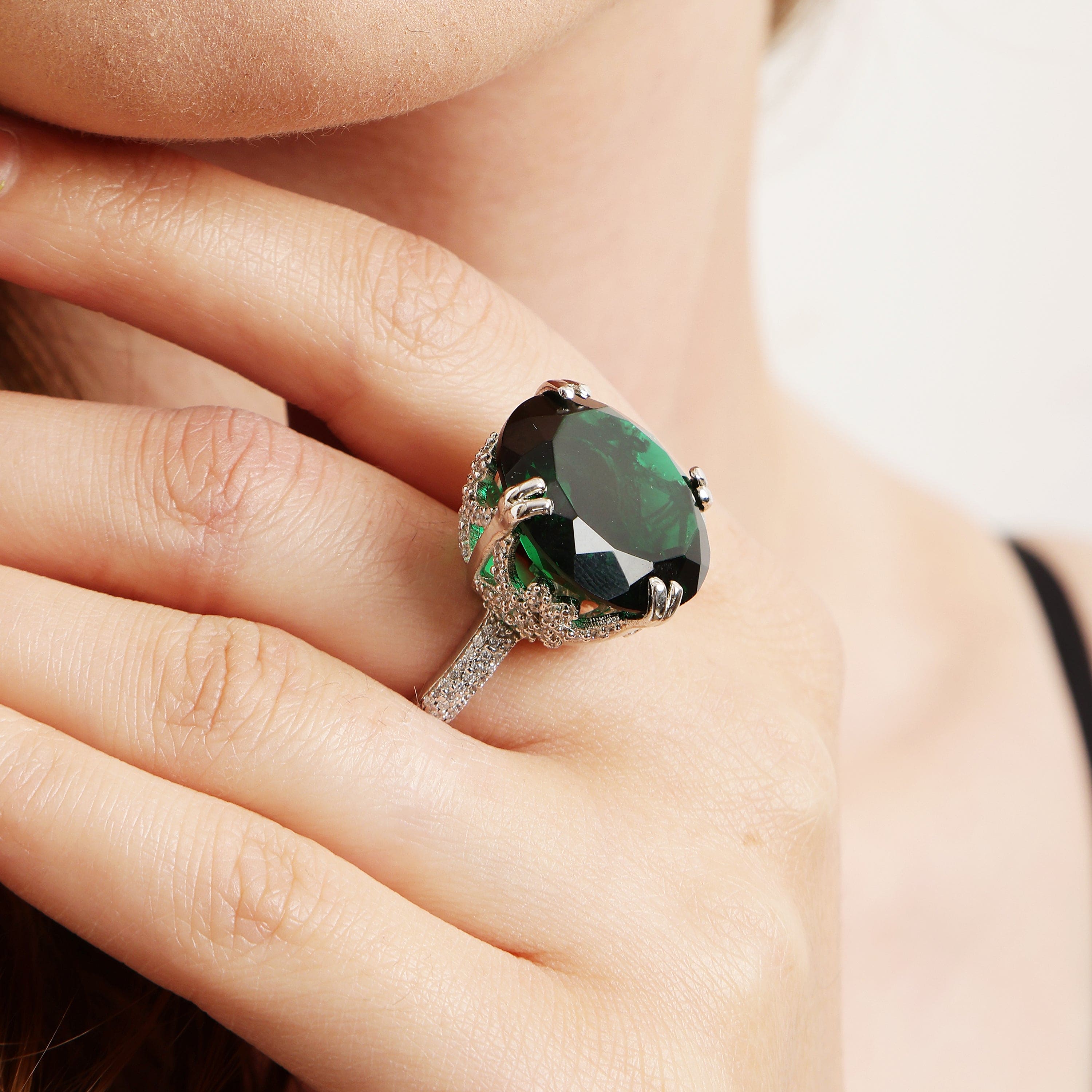 Emerald Serenade sterling silver ring worn on hand