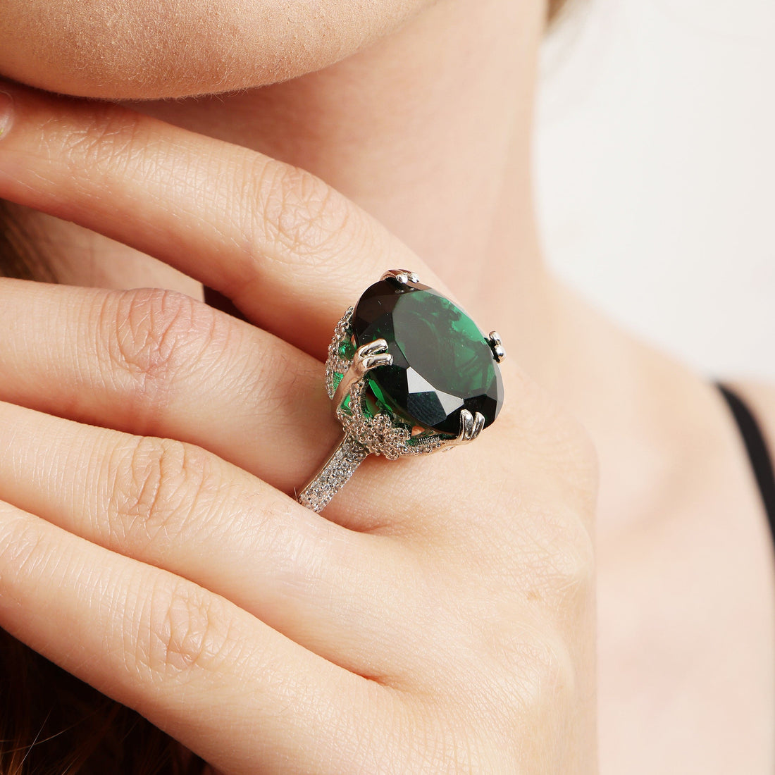 Emerald Serenade sterling silver ring worn on hand