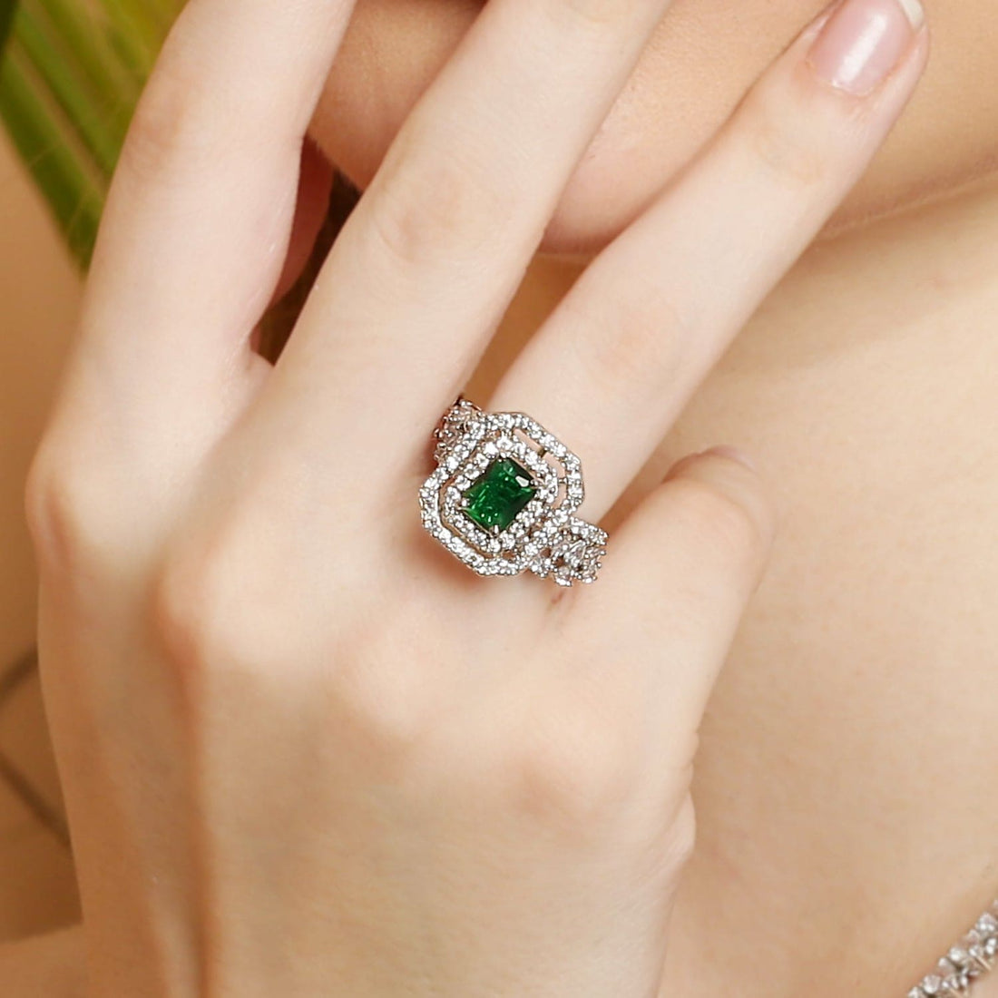 Enchanting Emerald Rhodium-Plated sterling silver ring worn on hand