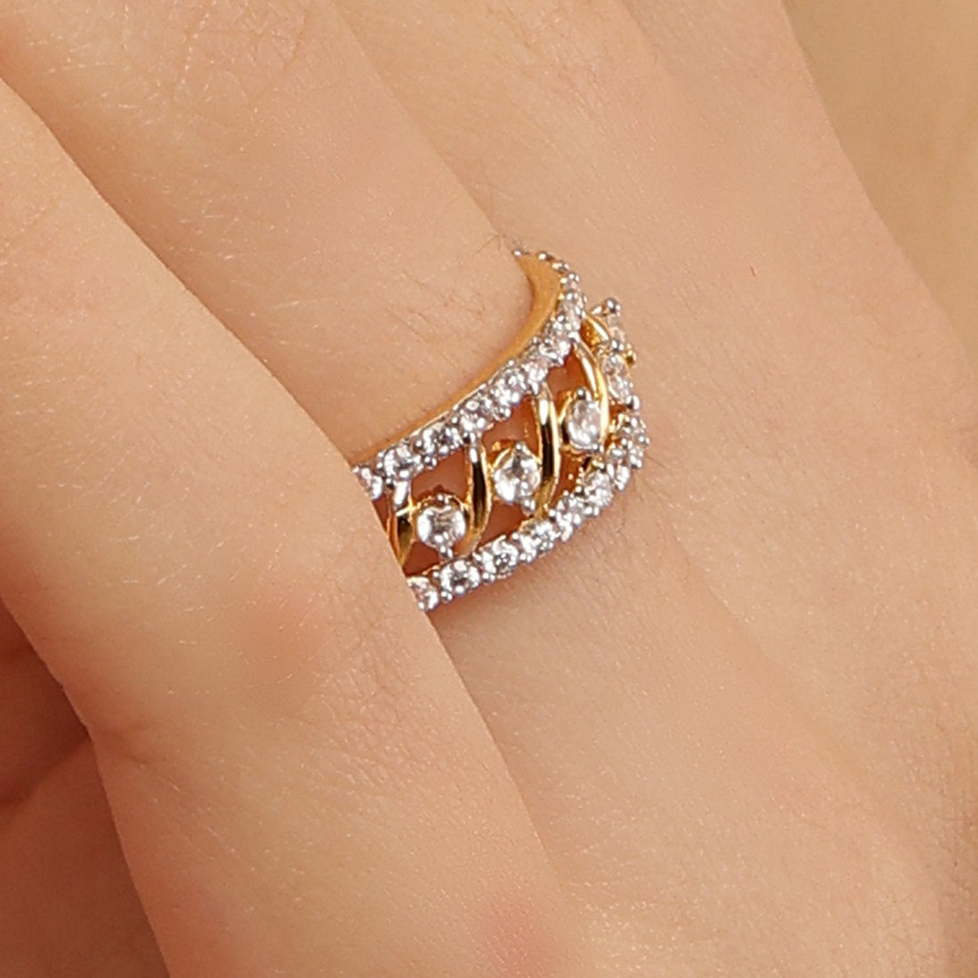 Exclusive gold plated sterling silver band worn on hand