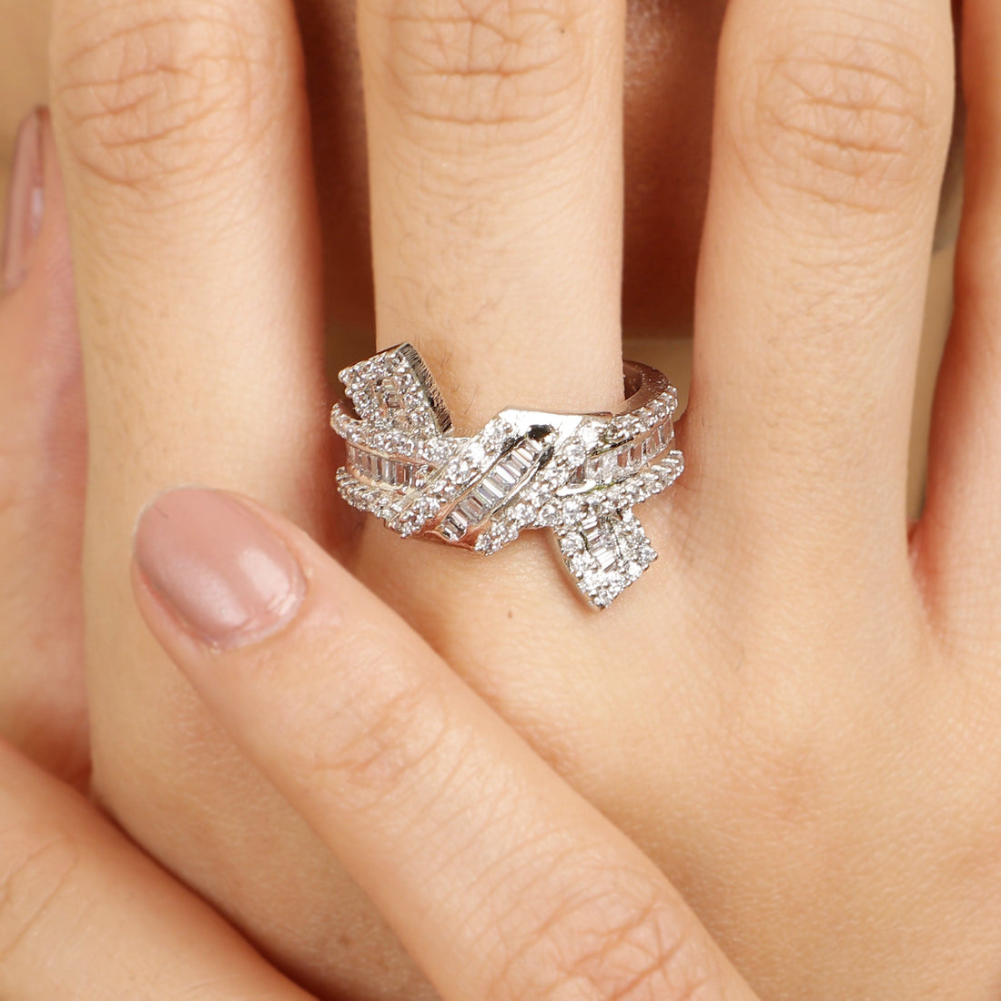 Forever Bowed 925 sterling silver ring worn on hand