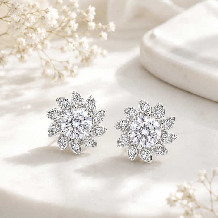 Elegant creative jewellery photo of silver polish Lunara Spark diamond stud earrings with luxury setup and sparkle