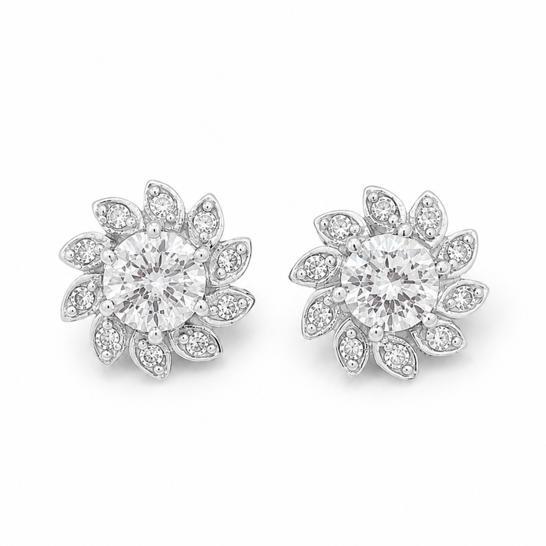 Creative luxury photo of white polish Lunara Spark diamond stud earrings with elegant styling and soft lighting