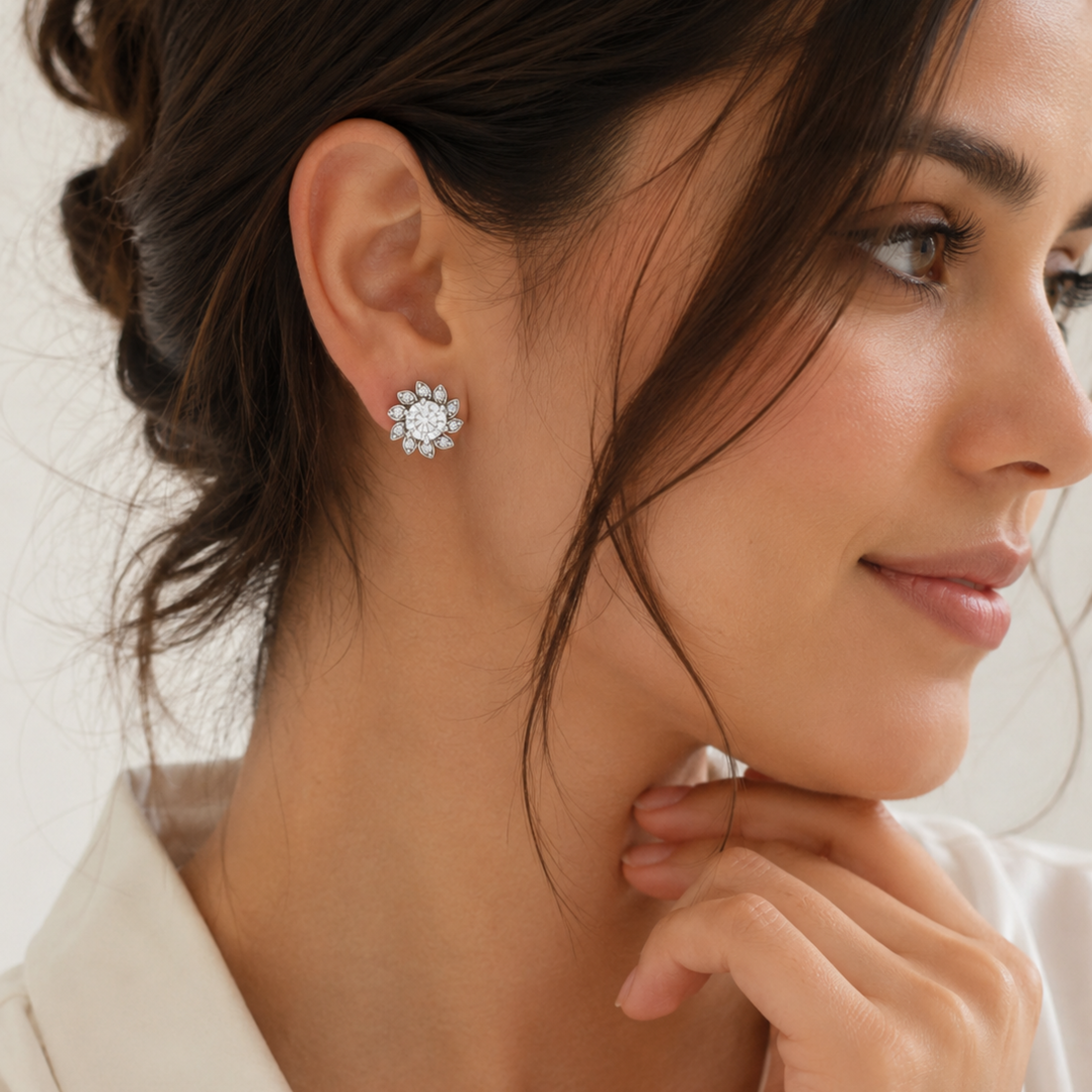 Beautiful model wearing white polish Lunara Spark diamond stud earrings realistic luxury jewellery photoshoot