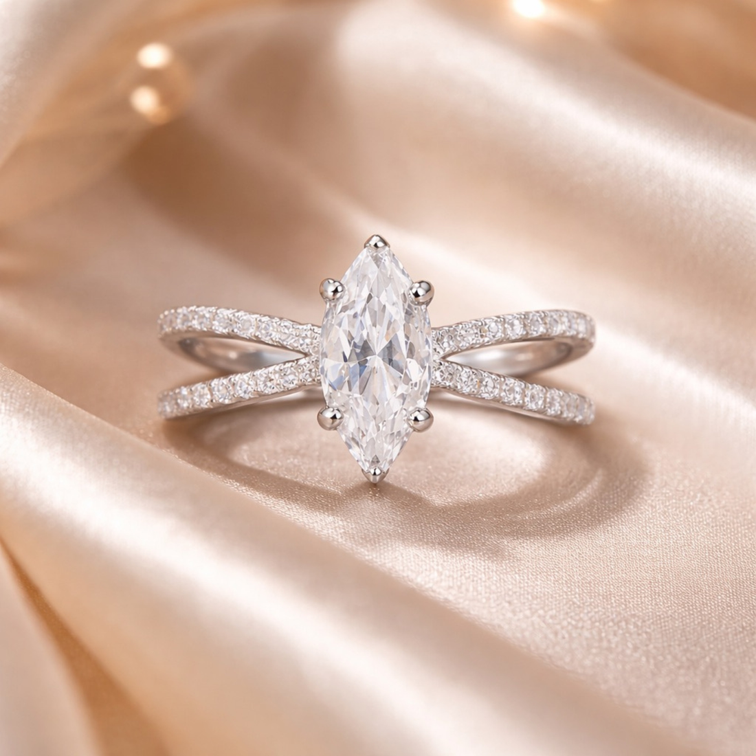     Elegant marquise diamond ring in white polish on beige background