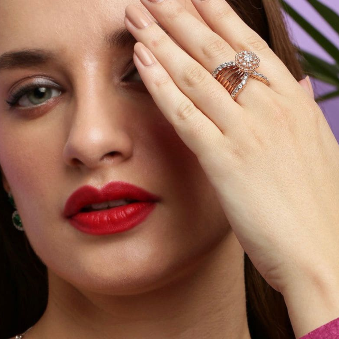 Elegant woman wearing 925 sterling silver rose gold diamond statement ring by Designed2Attract