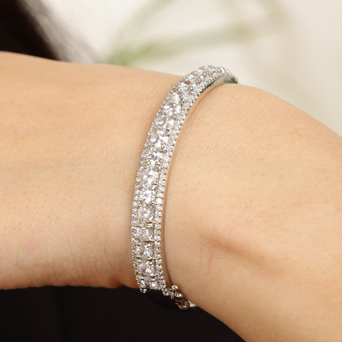 Nova Curve sterling silver bracelet worn on wrist
