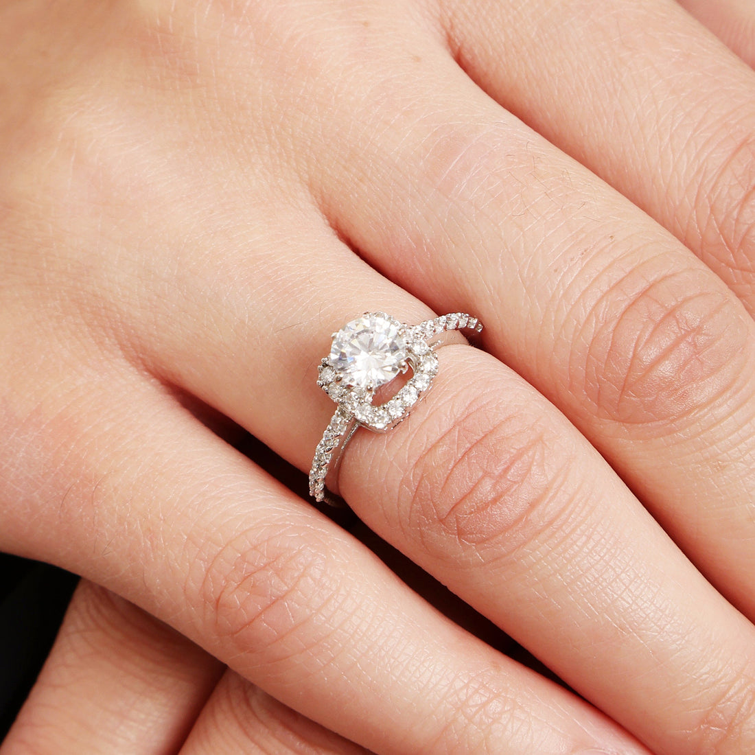 Radiant Minimal sterling silver ring worn on hand