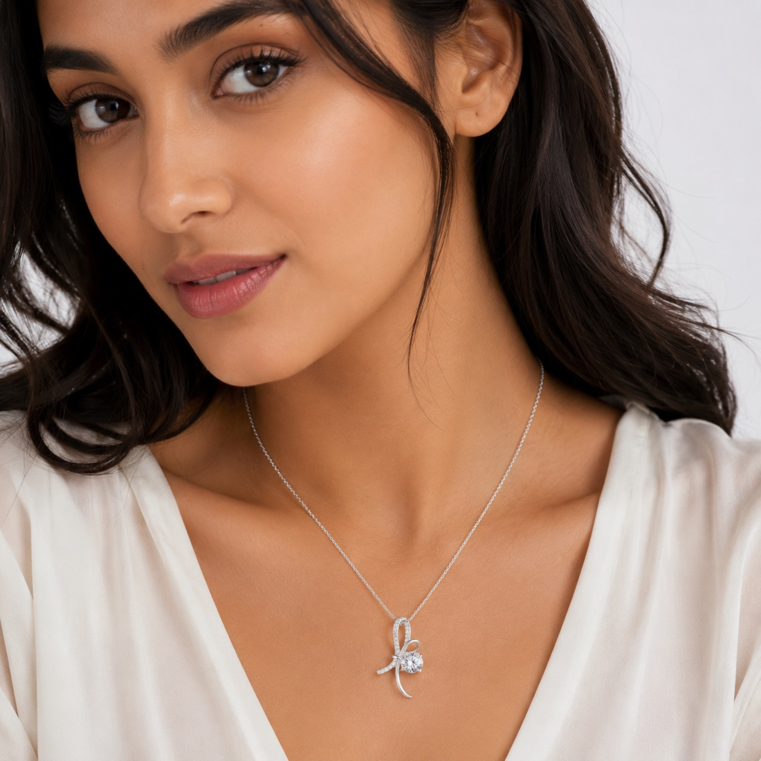 Model wear seraveller Luxe 925 silver pendant necklace in white polish with sparkling white stones and elegant design