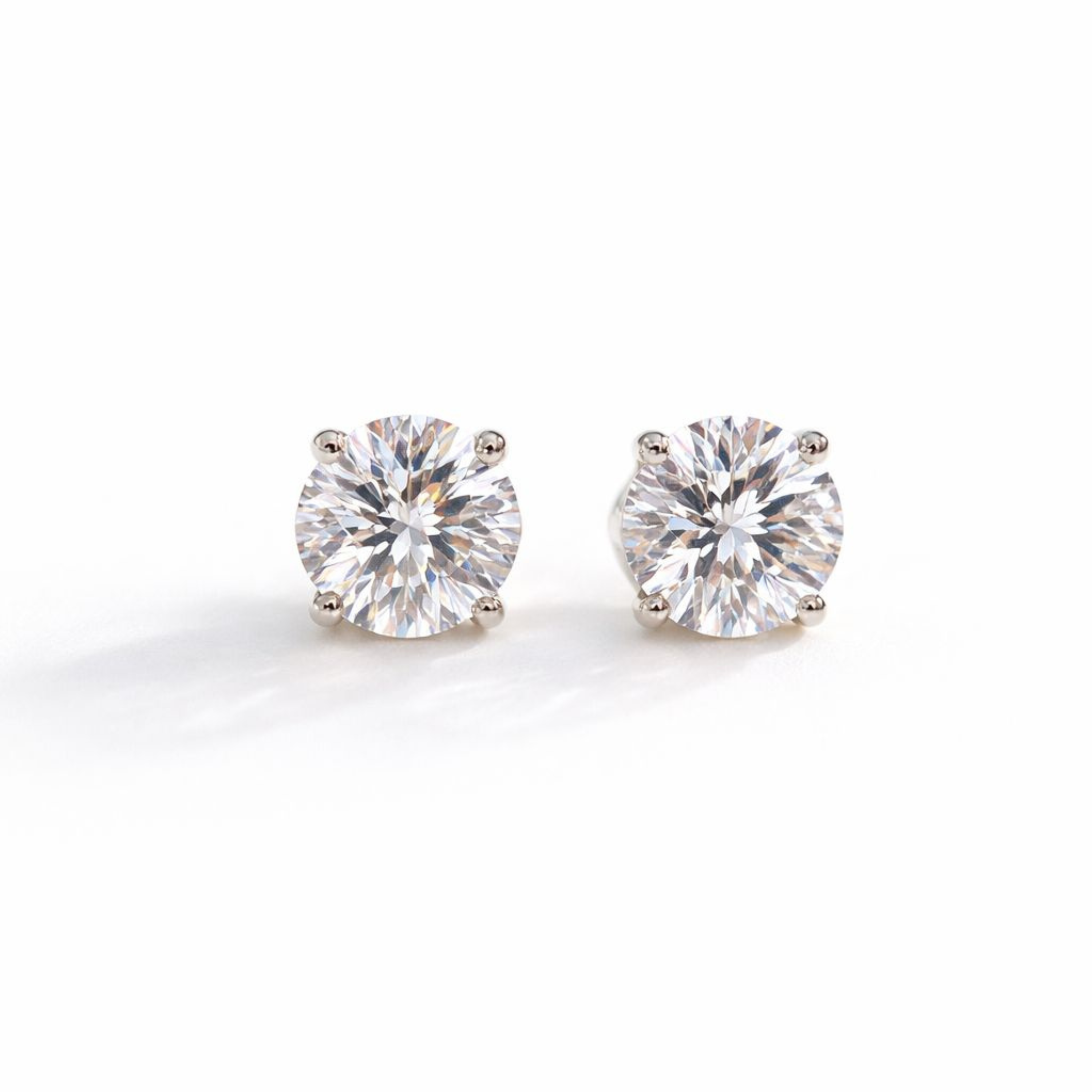 Single Solitaire sterling silver studs close-up detail