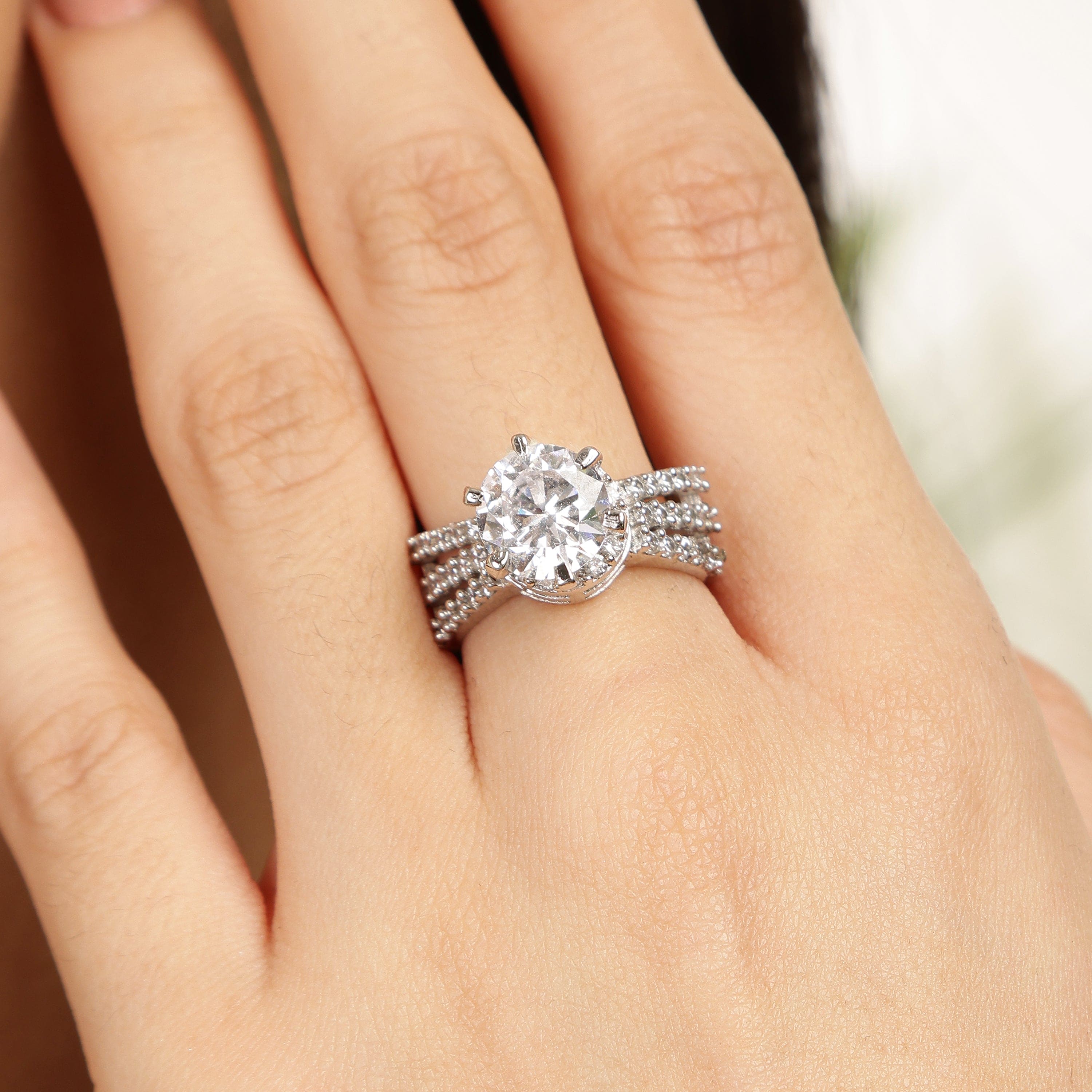 The Vogue Solitaire 925 sterling silver ring side angle view