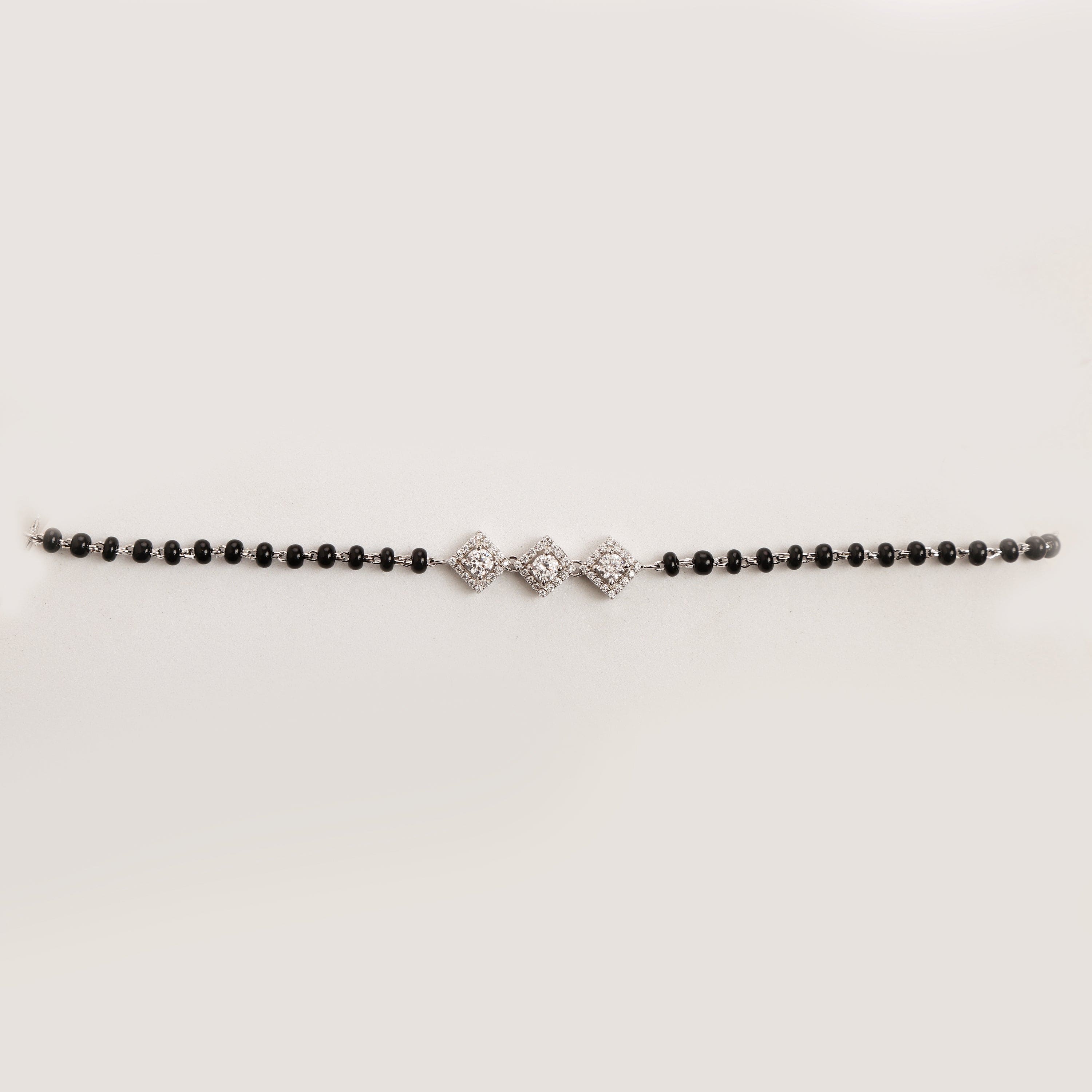 Trinity Charm Mangalsutra sterling silver bracelet worn on wrist