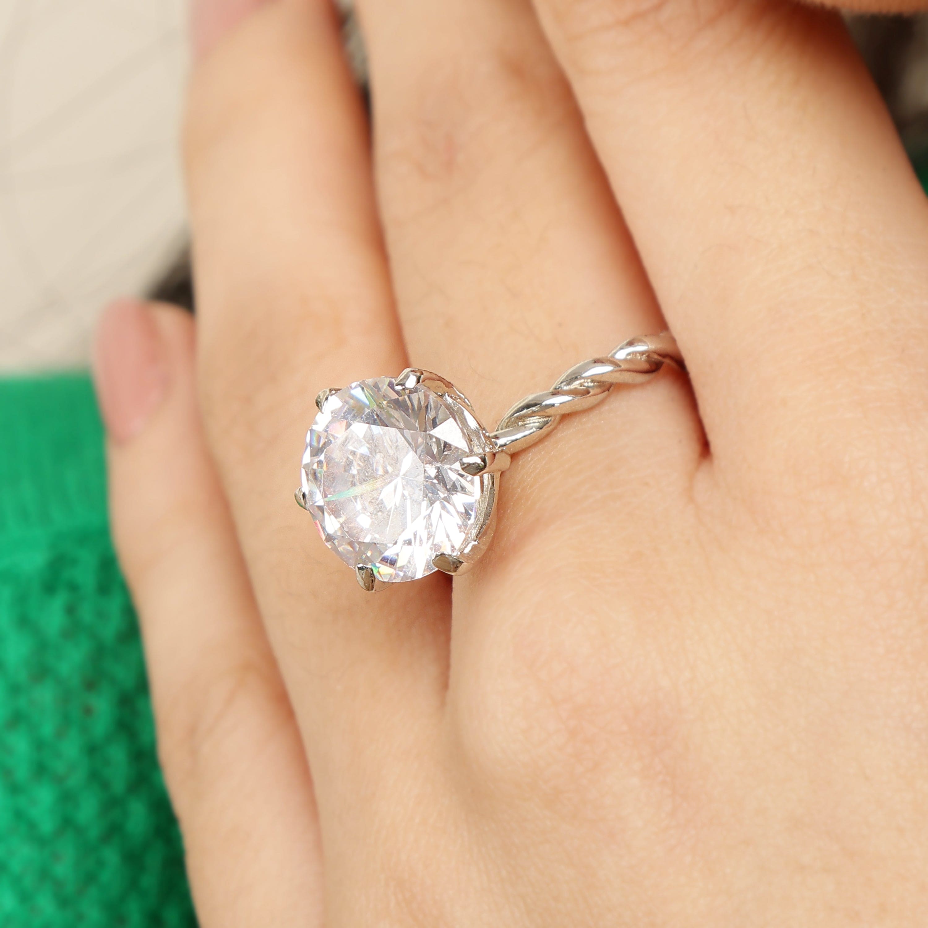 Twist of Forever 925 sterling silver ring worn on hand